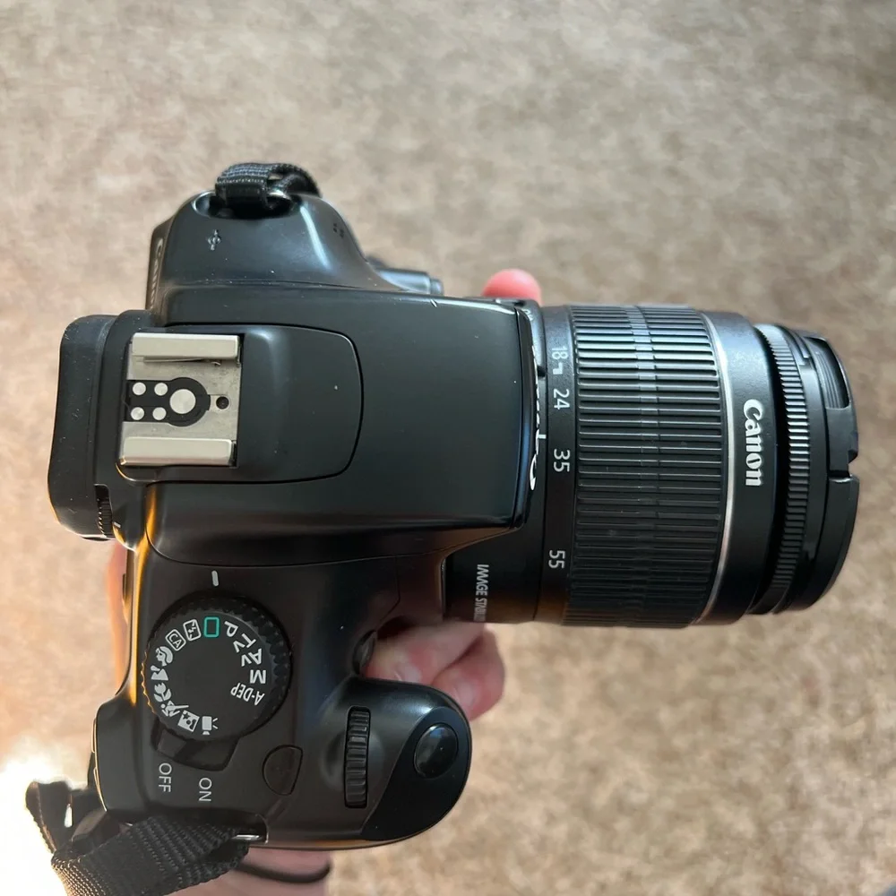 Cannon EOS 1100D camera with a 18-55 mm lens